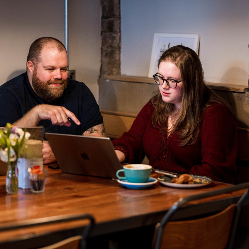 Billy Darroch talking to a small business owner about Shopify