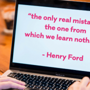 Henry Ford quote on a laptop screen - The only real mistake is the one from which we learn nothing