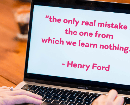 Henry Ford quote on a laptop screen - The only real mistake is the one from which we learn nothing